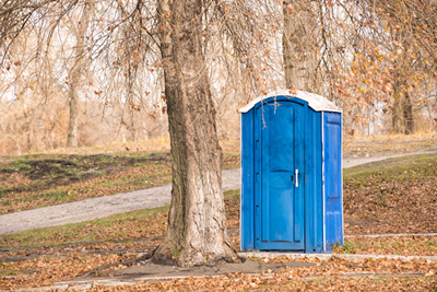 portable toilet in an outdoor setting